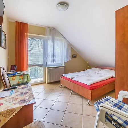 Проживание в семье Goscinne Neptun Острово